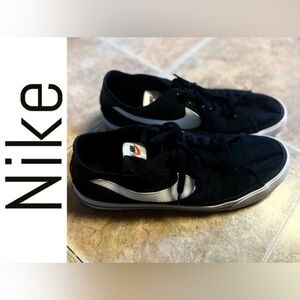 Nike Black and Silver Sneakers with Sleek Design